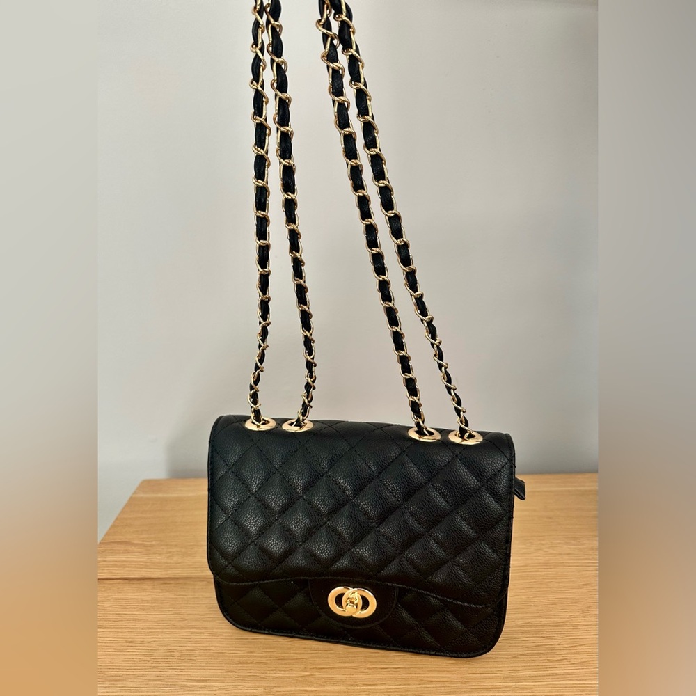 Black quilted purse with chain strap